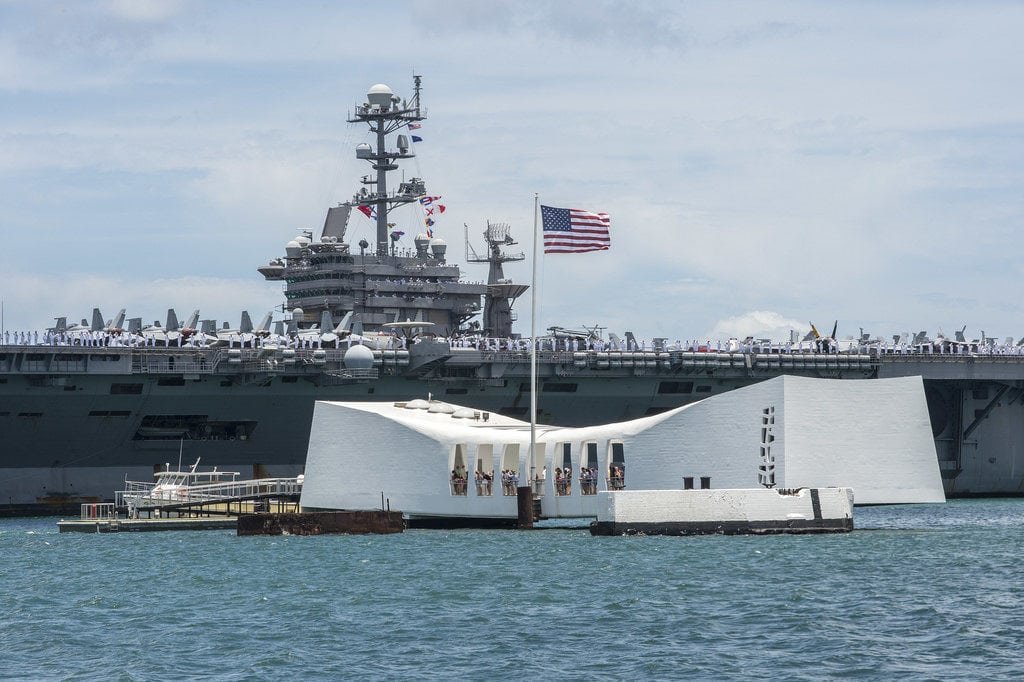 PEARL HARBOR, Hawaii - USS John C. Stennis (CVN 74) passes the USS Arizona Memorial as the Nimitz class aircraft carrier arrives at Joint Base Pearl Harbor-Hickam for Rim of the Pacific 2016. Twenty-six nations, more than 40 ships and submarines, more than 200 aircraft and 25,000 personnel are participating in RIMPAC from June 30 to Aug. 4, in and around the Hawaiian Islands and Southern California. The world's largest international maritime exercise, RIMPAC provides a unique training opportunity that helps participants foster and sustain the cooperative relationship that are critical to ensuring the safety of sea lanes and security on the world's oceans. RIMPAC 2016 is the 25th exercise in the series that began in 1971. (Photo by U.S. Navy photo by Mass Communication Specialist 2nd Class Katarzyna Kobiljak)